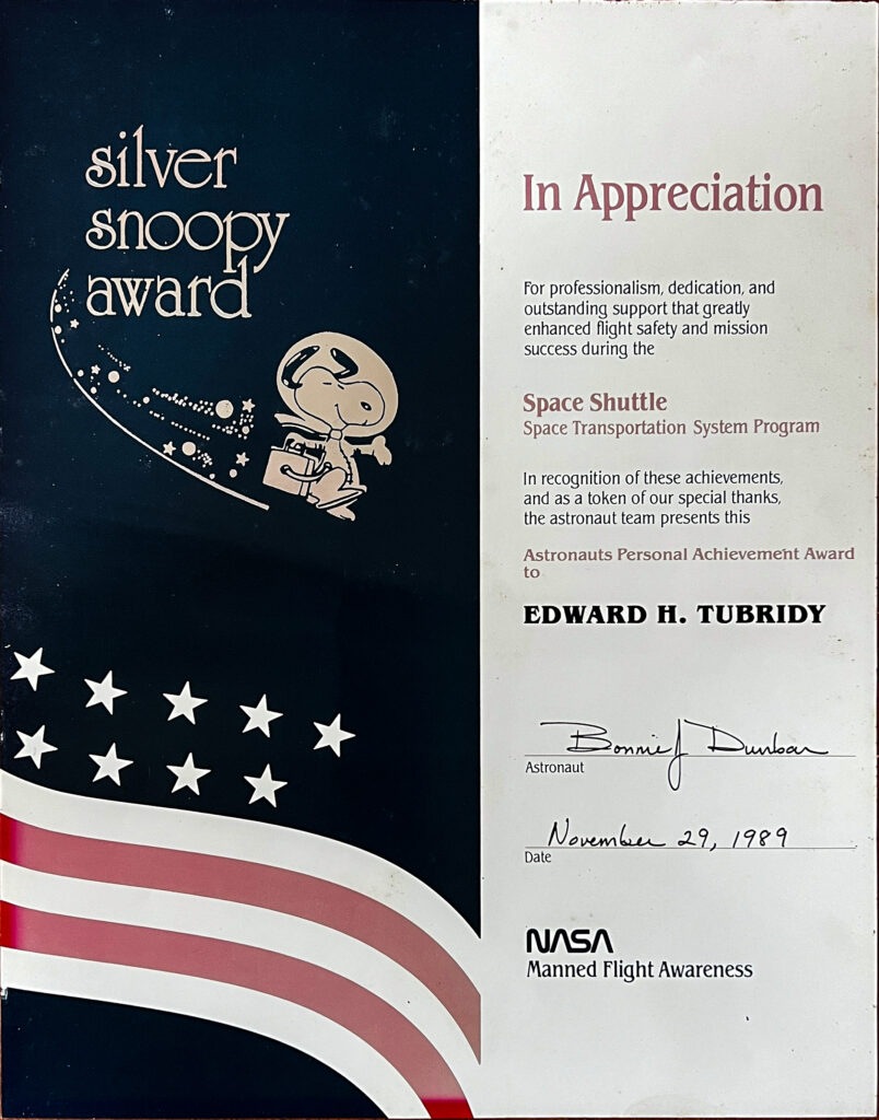 Silver Snoopy Award given to Dad