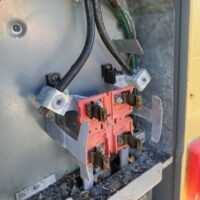 Picture of the electrical circuit box showing corrosion around the connectors